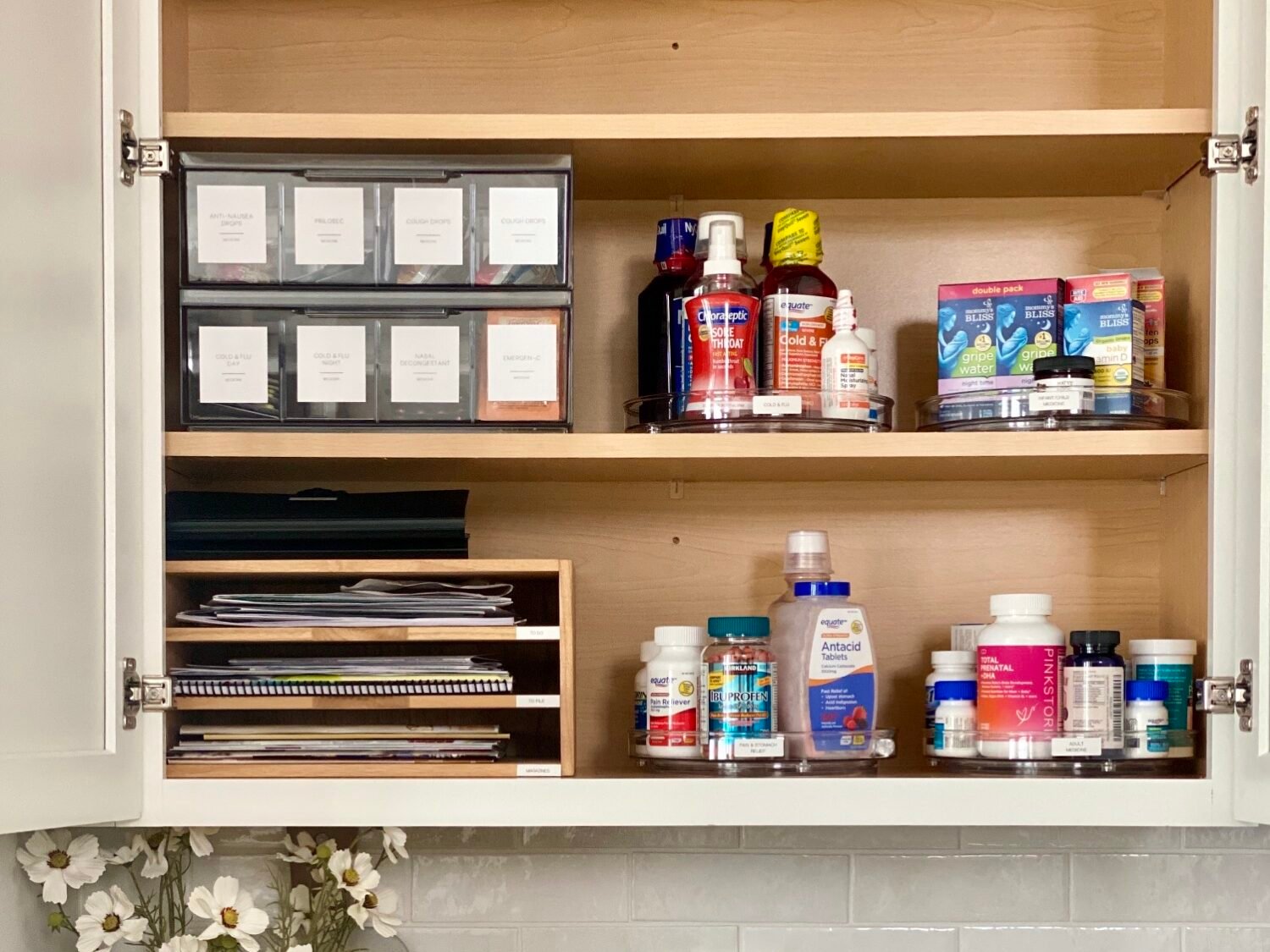 Organize paperwork in a commonly used cabinet