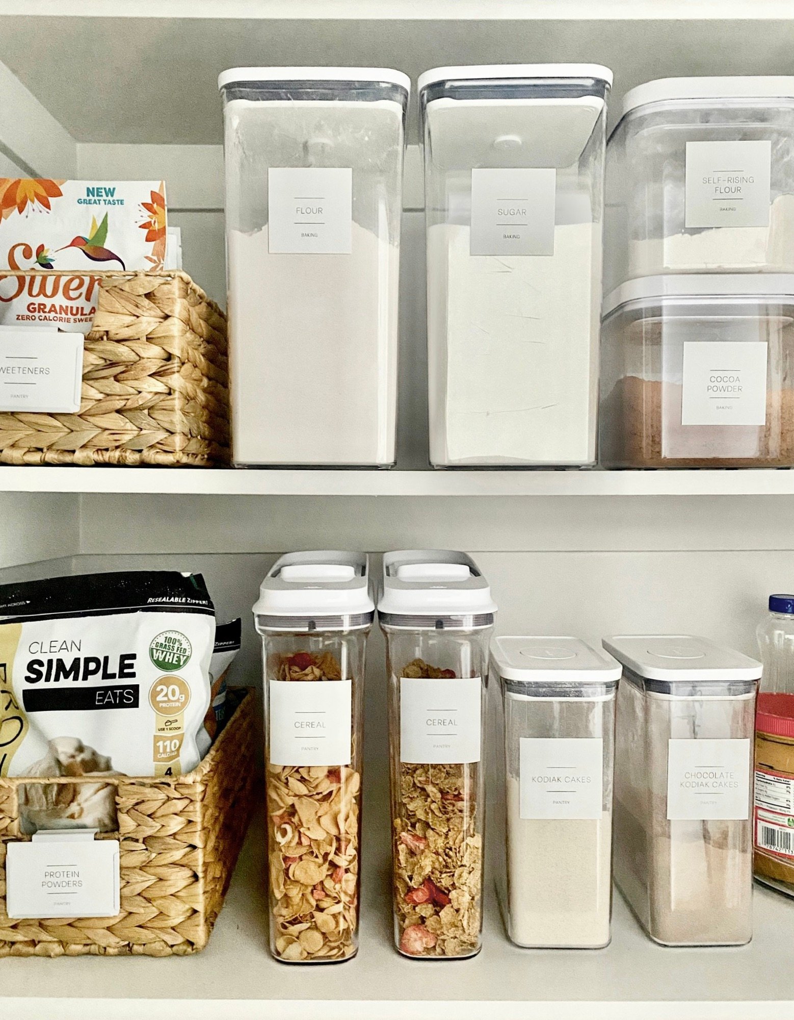 Pantry showing containers labeled with DIY labels